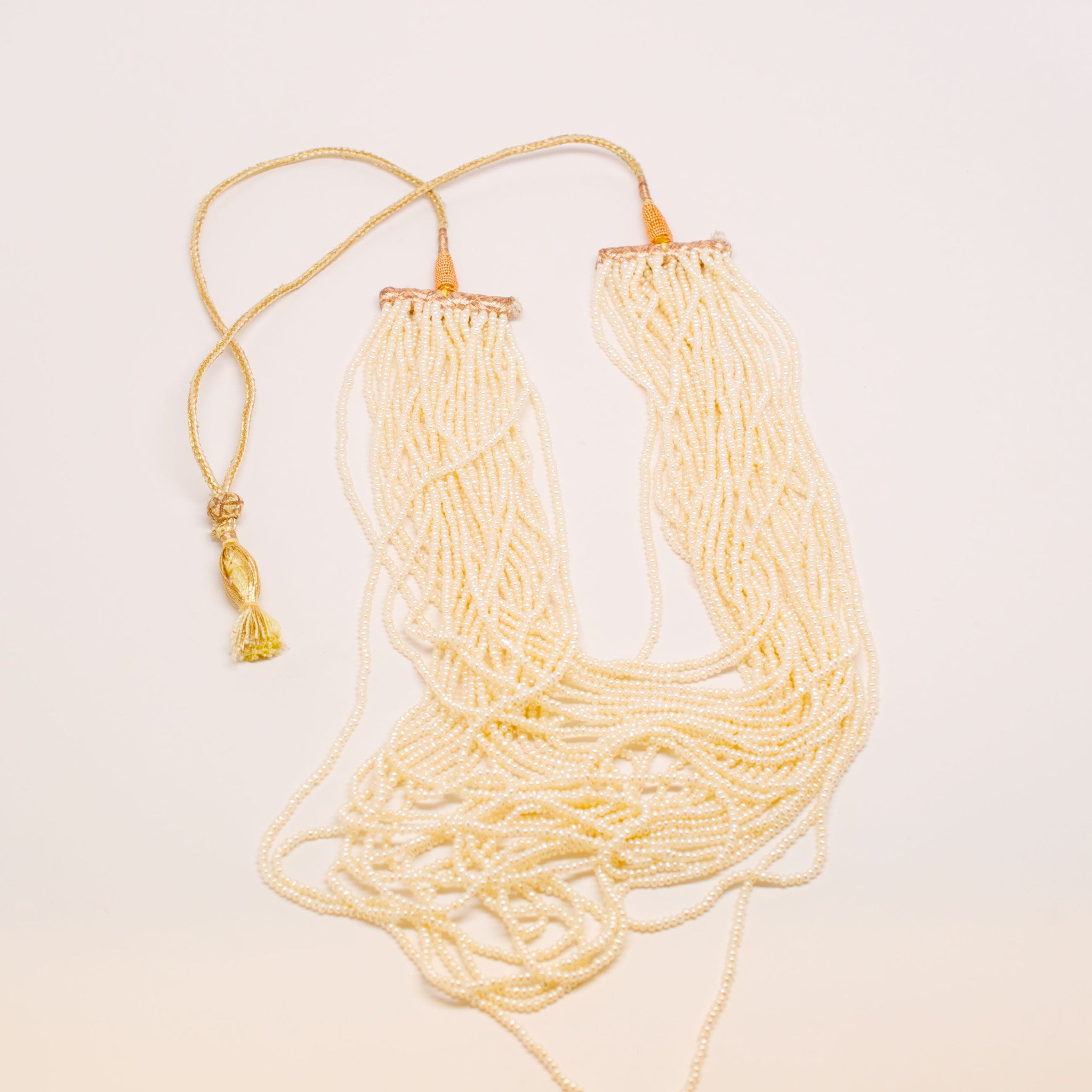 Indian multi strand natural seed pearl Necklace With Gold Wovern